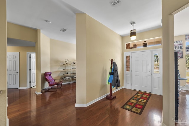 7770 Fenwick St, Navarre, FL 32566 - entrance foyer with wood finished floors and baseboards