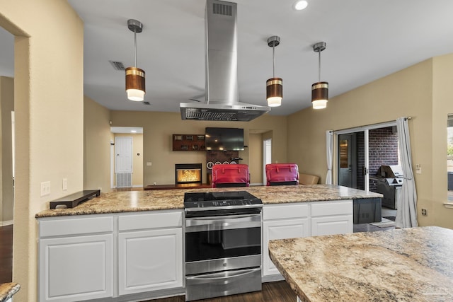 7770 Fenwick St, Navarre, FL 32566 - kitchen featuring stainless steel range with electric stovetop, wall chimney exhaust hood, white cabinetry, open floor plan, and dark wood-style flooring