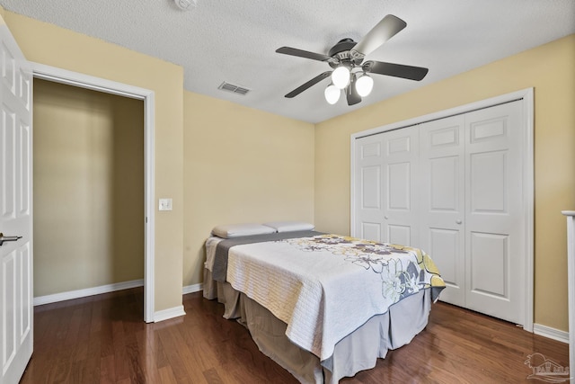 7770 Fenwick St, Navarre, FL 32566 - bedroom featuring wood finished floors, a closet, and ceiling fan