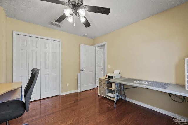 7770 Fenwick St, Navarre, FL 32566 - office area with ceiling fan and dark wood finished floors