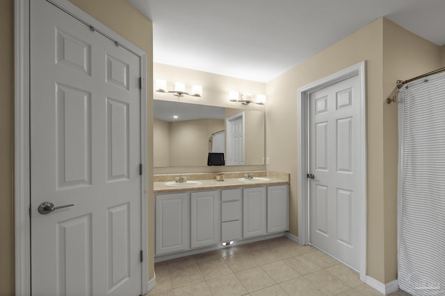 7770 Fenwick St, Navarre, FL 32566 - full bath featuring double vanity and tile patterned floors