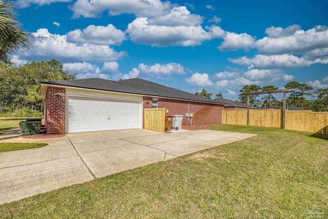 7770 Fenwick St, Navarre, FL 32566 - view of side of home with brick siding, an attached garage, and concrete driveway