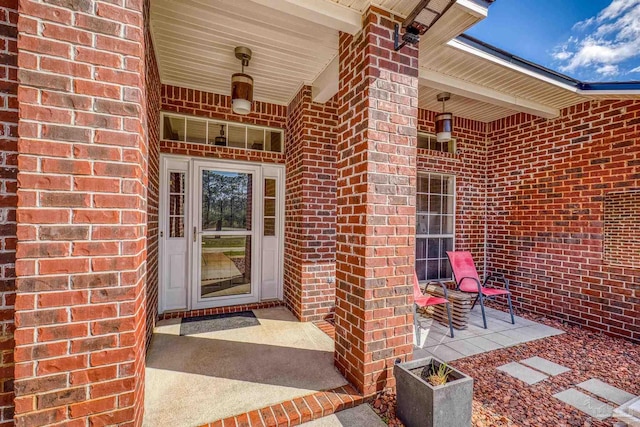 7770 Fenwick St, Navarre, FL 32566 - view of exterior entry featuring brick siding