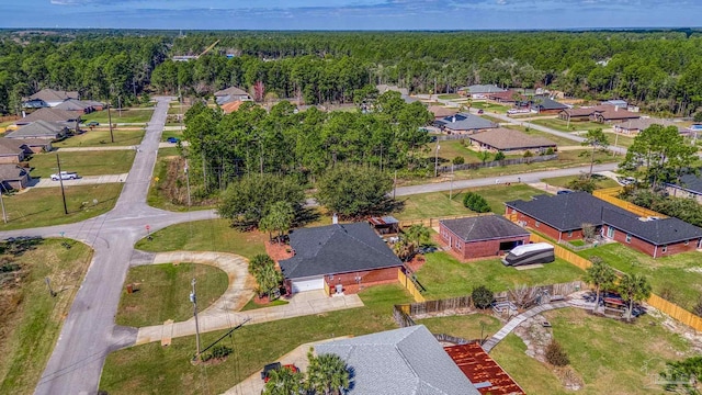 7770 Fenwick St, Navarre, FL 32566 - view of property location featuring a heavily wooded area and nearby suburban area