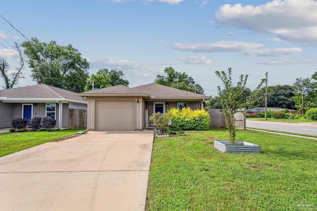 ranch-style home featuring a garage and a front yard