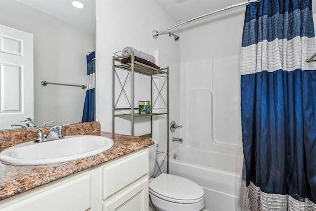 full bathroom with vanity, toilet, and shower / tub combo with curtain