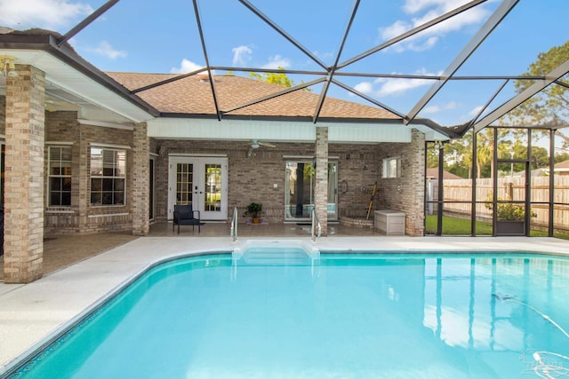 5140 Grumann Dr, Pensacola, FL 32507 - view of swimming pool with a patio, a ceiling fan, glass enclosure, and fence