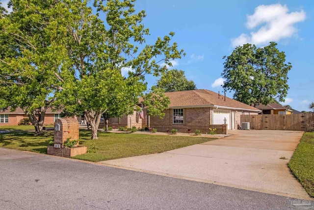 5140 Grumann Dr, Pensacola, FL 32507 - single story home featuring driveway, a garage, brick siding, and central AC