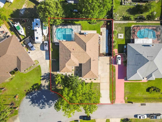 5140 Grumann Dr, Pensacola, FL 32507 - aerial view of property and surrounding area with property boundaries highlighted and a pool