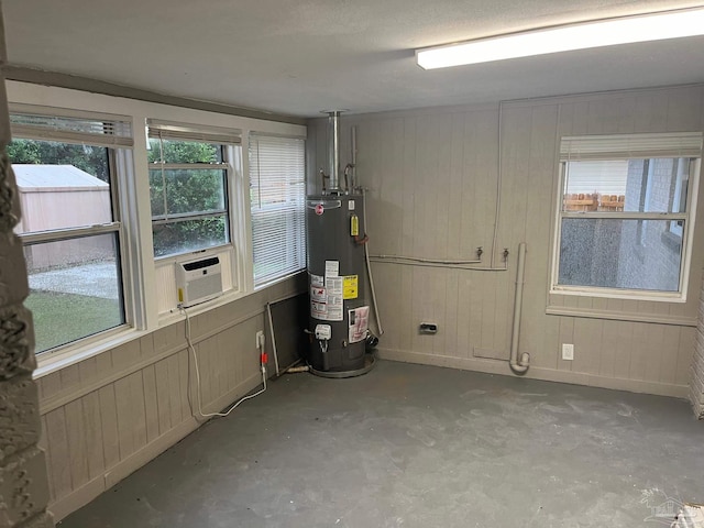 utilities with gas water heater and cooling unit