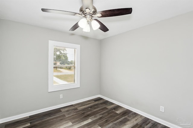 unfurnished room with ceiling fan and dark hardwood / wood-style flooring