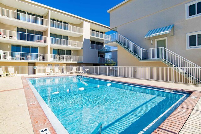 1111 Ft Pickens Rd Unit 524, Pensacola Beach, FL 32561 - community pool featuring fence