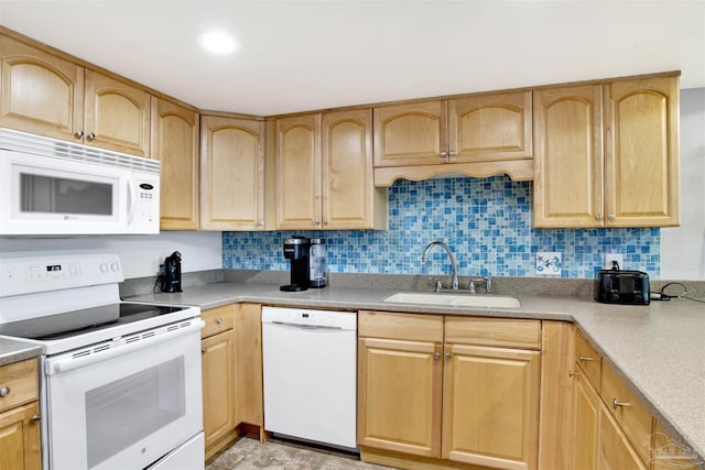 1111 Ft Pickens Rd Unit 524, Pensacola Beach, FL 32561 - kitchen with white appliances, a sink, light brown cabinets, and light countertops