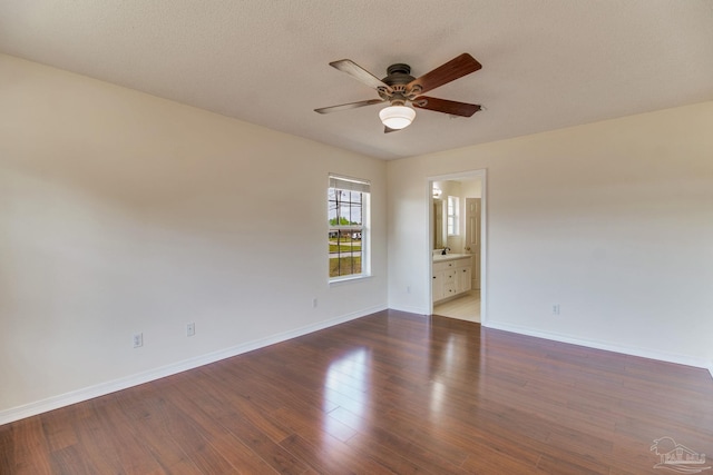 3086 Myrshine Dr, Pensacola, FL 32506 - empty room featuring wood finished floors, baseboards, and ceiling fan