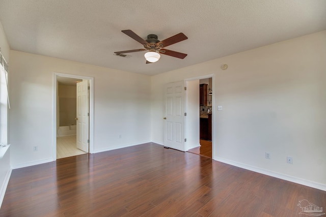3086 Myrshine Dr, Pensacola, FL 32506 - empty room with ceiling fan, baseboards, dark wood-type flooring, and visible vents