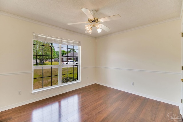 3086 Myrshine Dr, Pensacola, FL 32506 - empty room with crown molding, wood finished floors, a textured ceiling, and a ceiling fan