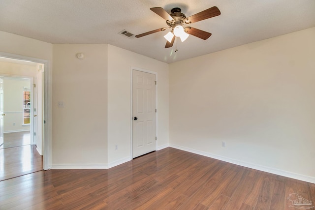3086 Myrshine Dr, Pensacola, FL 32506 - spare room featuring baseboards, wood finished floors, visible vents, and a ceiling fan