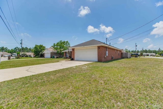 3086 Myrshine Dr, Pensacola, FL 32506 - ranch-style home featuring concrete driveway, a front lawn, brick siding, and a garage