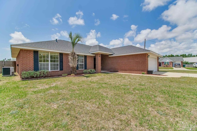 3086 Myrshine Dr, Pensacola, FL 32506 - single story home featuring a front lawn, driveway, an attached garage, cooling unit, and brick siding