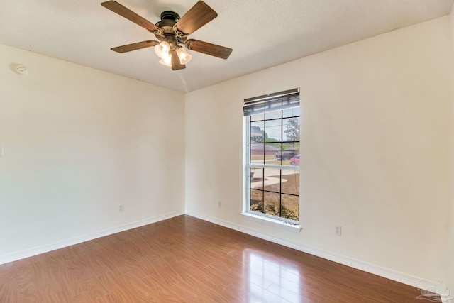 3086 Myrshine Dr, Pensacola, FL 32506 - empty room featuring baseboards, a ceiling fan, and wood finished floors