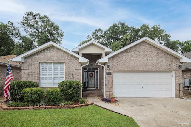 1013 Patriot Pl, Pensacola, FL 32534 - ranch-style home featuring a garage and a front lawn