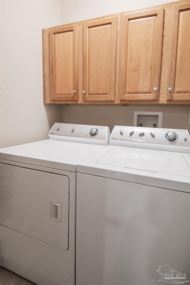 1013 Patriot Pl, Pensacola, FL 32534 - laundry area with cabinets and independent washer and dryer