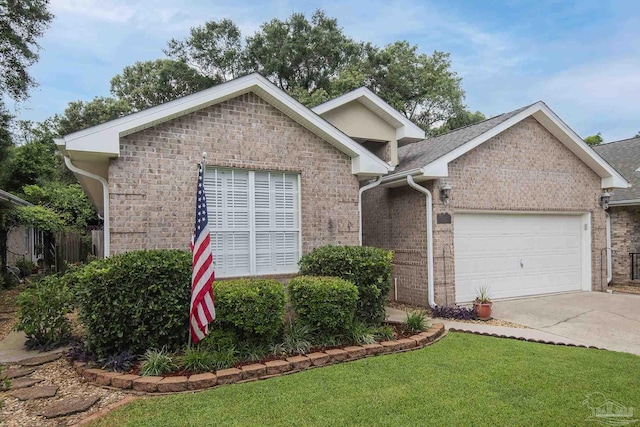 1013 Patriot Pl, Pensacola, FL 32534 - view of front of house featuring a garage and a front lawn