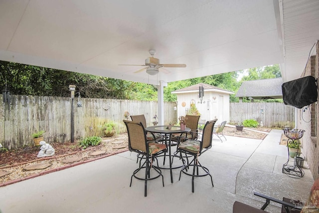 1013 Patriot Pl, Pensacola, FL 32534 - view of patio featuring ceiling fan and a storage unit