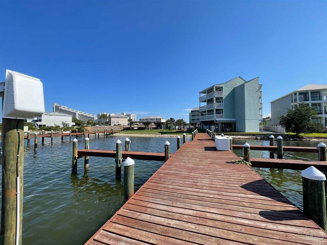 dock area featuring a water view