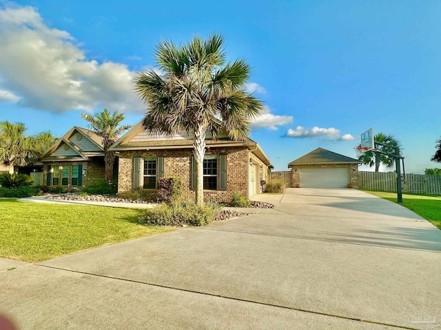 2665 Tulip Hill Rd, Pace, FL 32571 - view of front of home featuring brick siding and a detached garage
