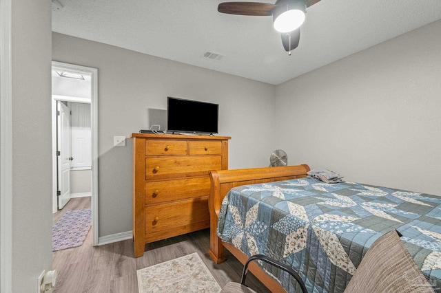 6856 Old W Ln, Milton, FL 32570 - bedroom featuring wood finished floors, baseboards, and ceiling fan