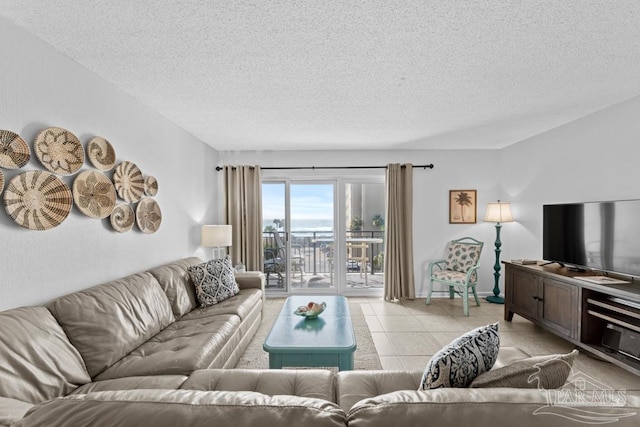 tiled living room with a textured ceiling