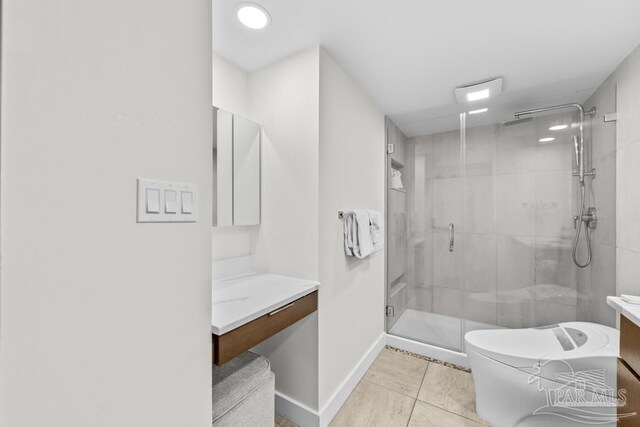 bathroom featuring vanity, an enclosed shower, and toilet