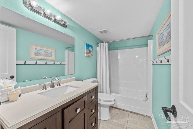 full bathroom featuring shower / bathtub combination with curtain, vanity, tile patterned floors, and toilet