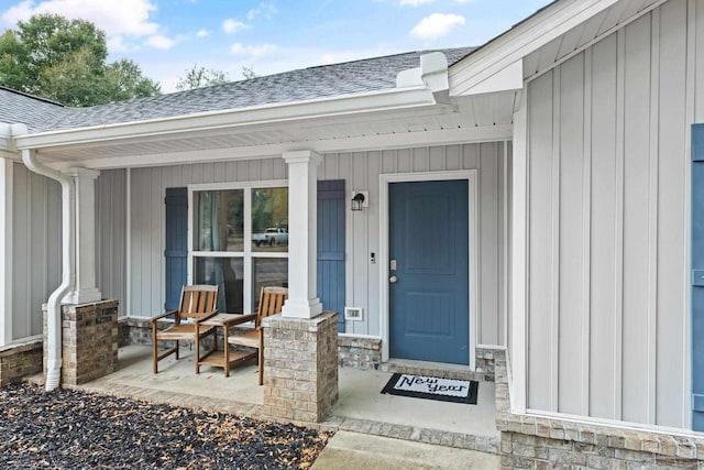 entrance to property featuring a porch