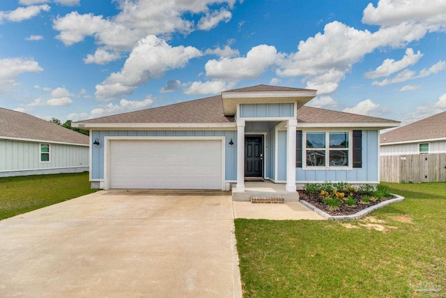 10885 Blacktail Loop, Pensacola, FL 32526 - ranch-style home featuring a garage, roof with shingles, and board and batten siding