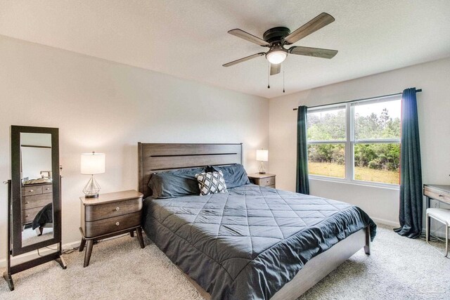 10885 Blacktail Loop, Pensacola, FL 32526 - carpeted bedroom featuring baseboards and a ceiling fan