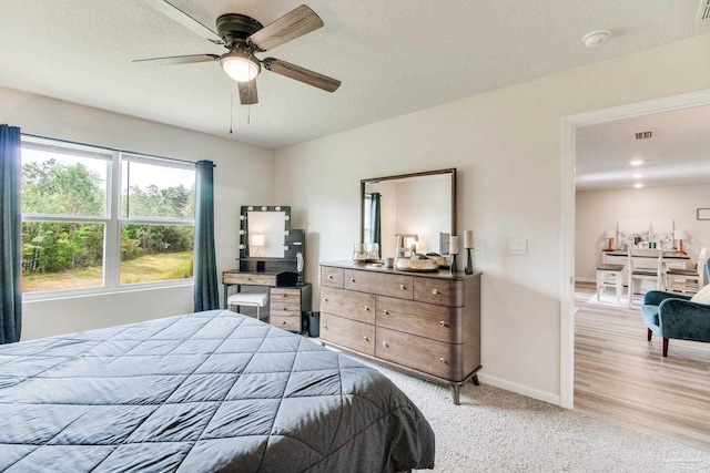 10885 Blacktail Loop, Pensacola, FL 32526 - bedroom with baseboards and ceiling fan