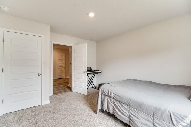 10885 Blacktail Loop, Pensacola, FL 32526 - bedroom featuring light colored carpet, baseboards, and recessed lighting