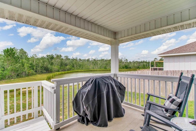 10885 Blacktail Loop, Pensacola, FL 32526 - wooden deck with a water view, a yard, and a grill