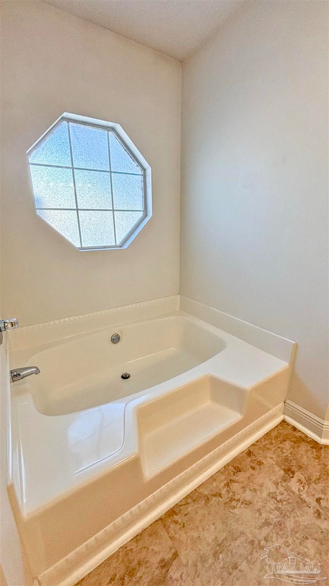 bathroom featuring a bathtub