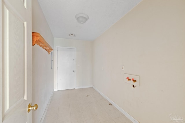 3570 Firestone Blvd, Pensacola, FL 32503 - hallway featuring baseboards, a textured ceiling, and visible vents