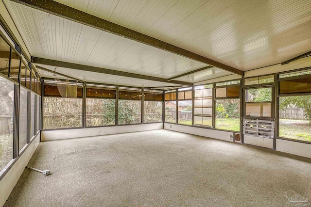 3570 Firestone Blvd, Pensacola, FL 32503 - unfurnished sunroom featuring beam ceiling and carpet flooring