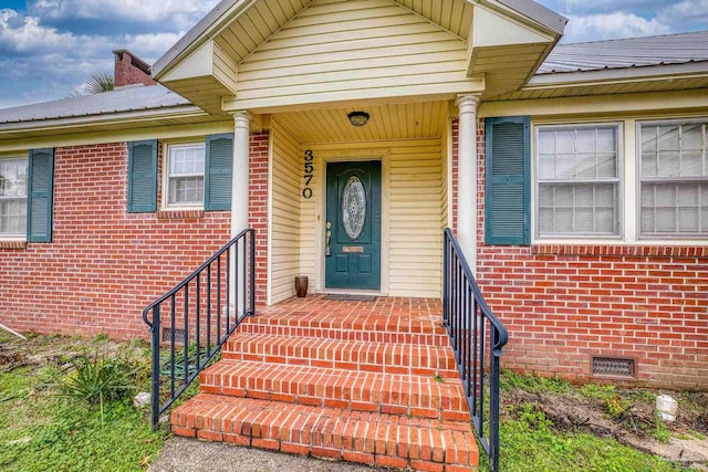 3570 Firestone Blvd, Pensacola, FL 32503 - view of exterior entry featuring brick siding and crawl space
