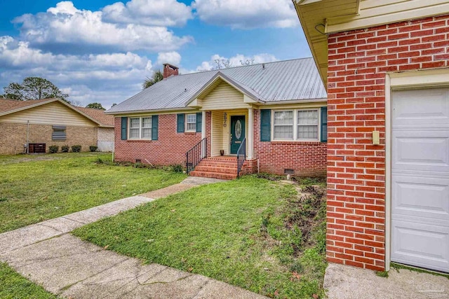 3570 Firestone Blvd, Pensacola, FL 32503 - single story home featuring brick siding, a front lawn, metal roof, crawl space, and central AC