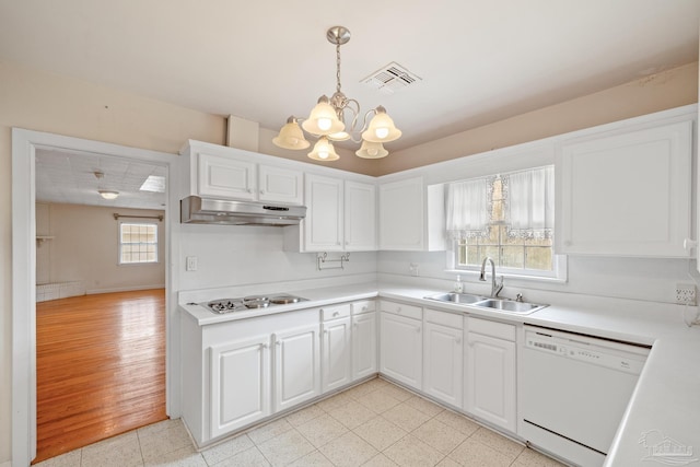 3570 Firestone Blvd, Pensacola, FL 32503 - kitchen featuring a sink, dishwasher, stovetop, under cabinet range hood, and visible vents