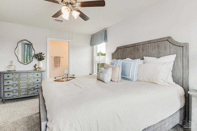 bedroom with visible vents, carpet, and a ceiling fan