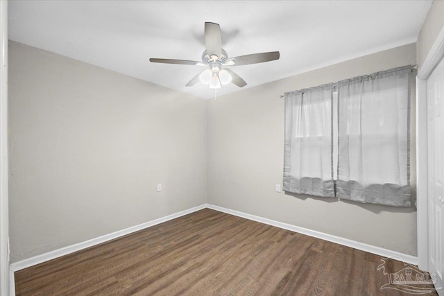 unfurnished room featuring ceiling fan and hardwood / wood-style floors