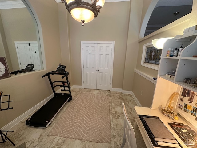 1988 Heritage Park Way, Navarre, FL 32566 - foyer featuring arched walkways, marble look tile flooring, and baseboards
