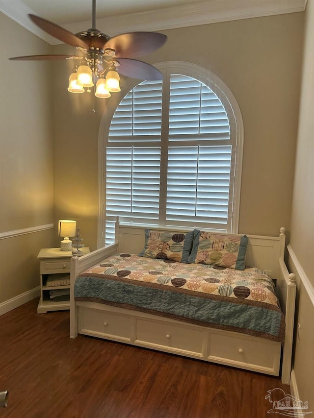 1988 Heritage Park Way, Navarre, FL 32566 - bedroom featuring wood finished floors, crown molding, and a ceiling fan